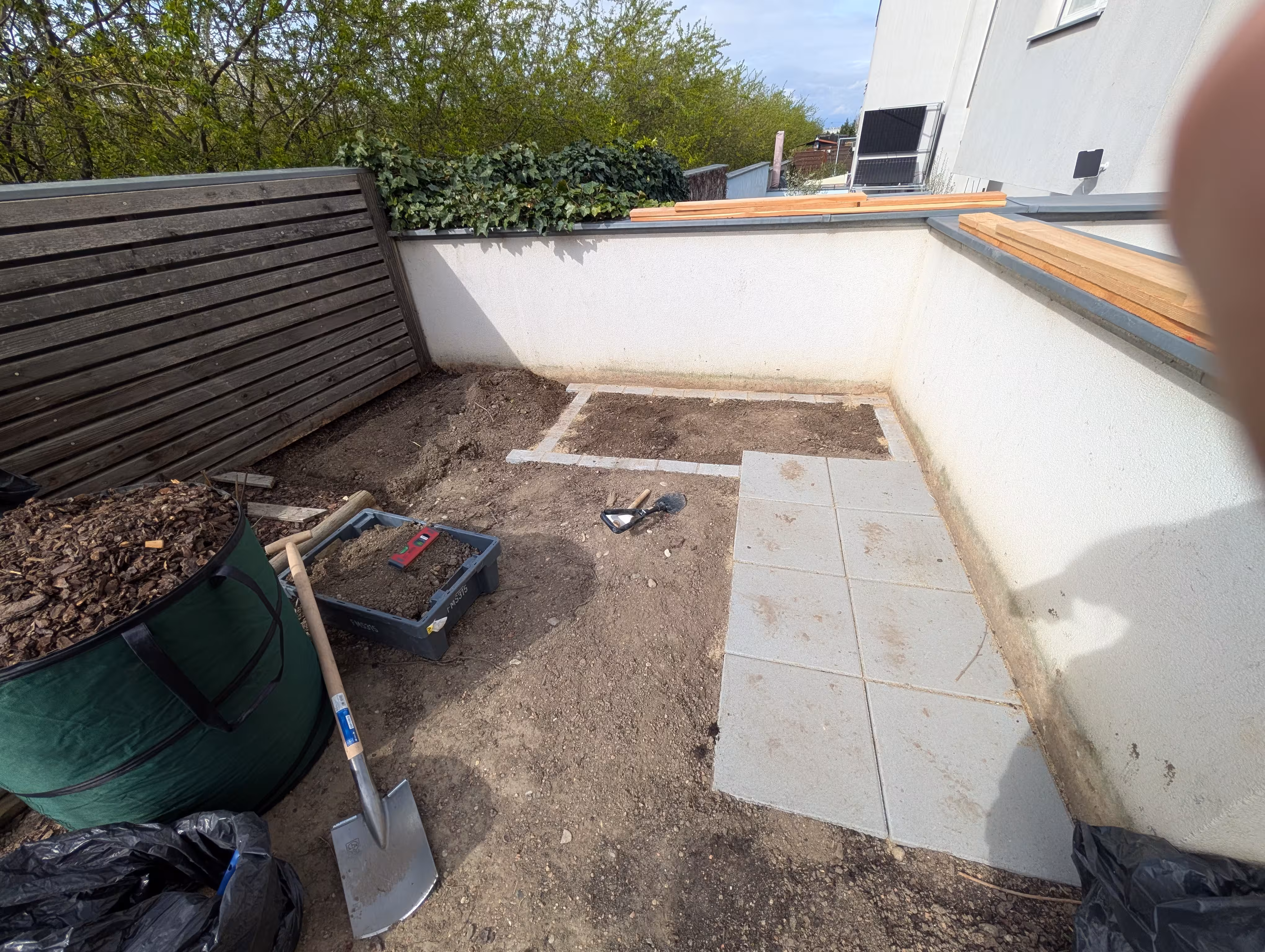 The foundation of the planter. It is finished on the right side but the left part is only dug out